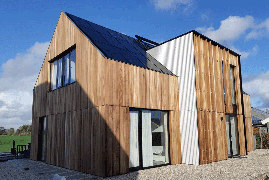 Studio voor Bouwkunst - moderne simplistische woning met entreeportaal uitgevoerd in volledig houten gevelbekleding - Blitsaerd, Leeuwarden